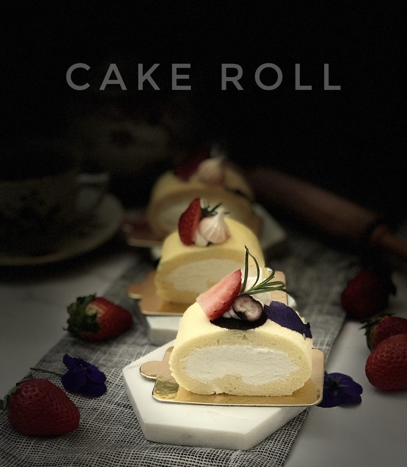 Vanilla cream cake roll with strawberries